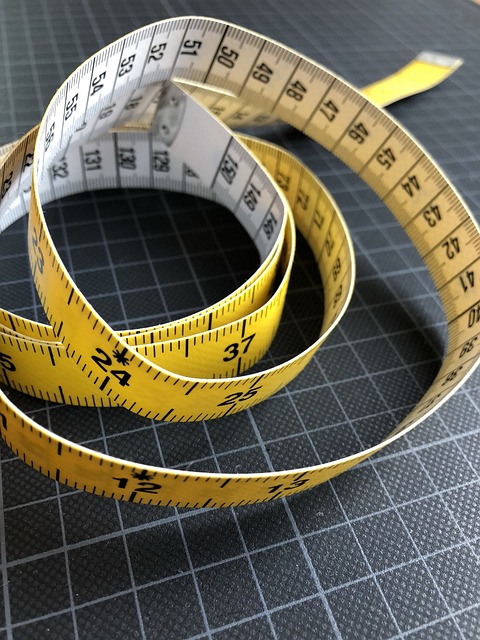 home textile course planning with fabric swatches scissors ruler and sewing tools
